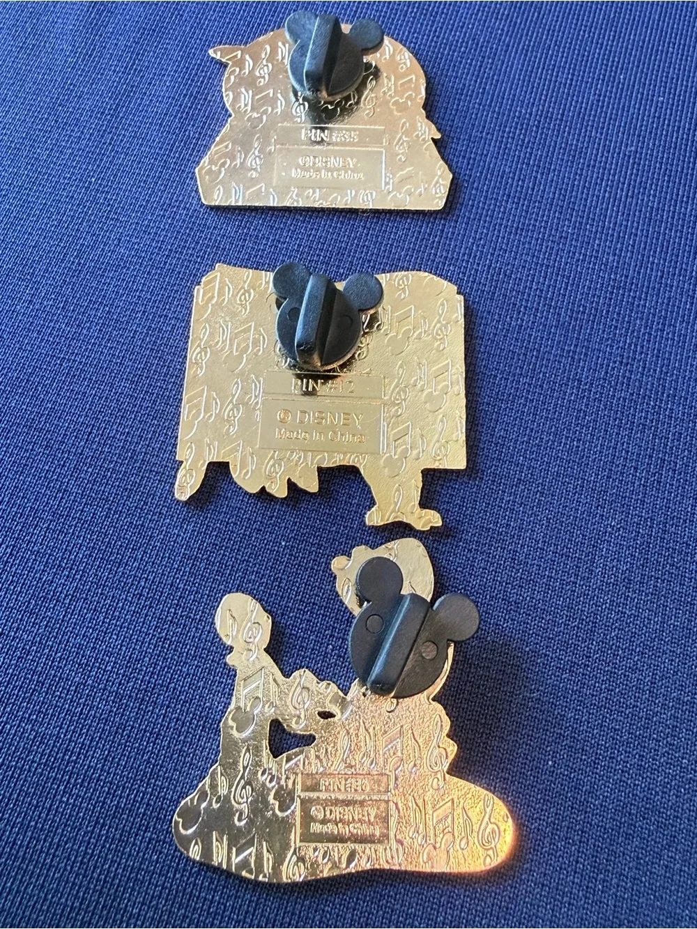 Disney Store 2002 Magical Musical Moments 12 pins Pooh Alice Lion King